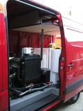 Van mounted pressure washer viewed from side door